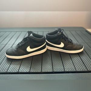 Nike Black and white mid high tops court vision
